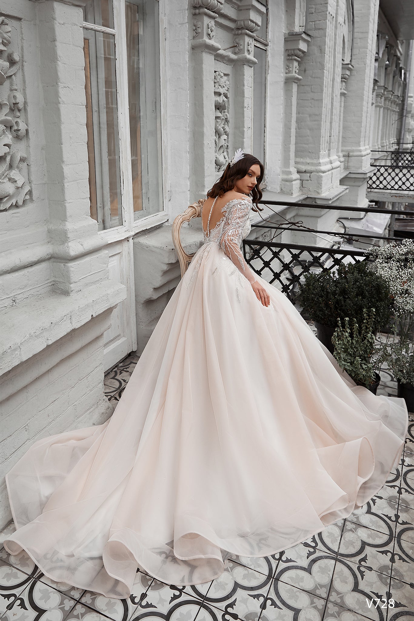 Off the shoulder long sleeve blush wedding dress