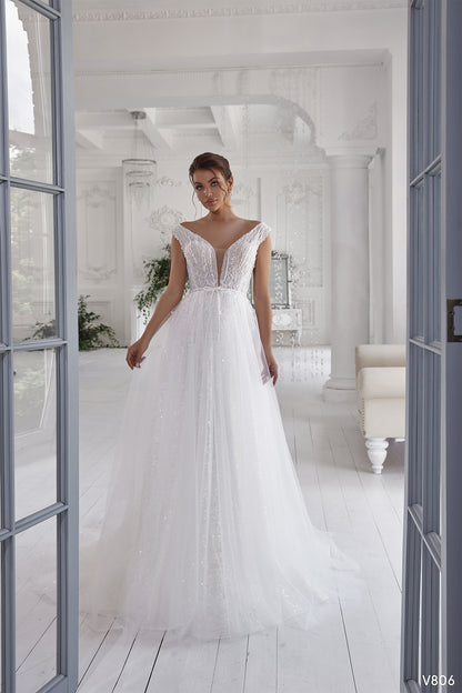 Wedding dress plunge | Wedding gowns with sequins | KatrinFAVOR