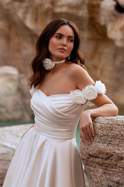 Off the shoulder satin wedding dress with pockets