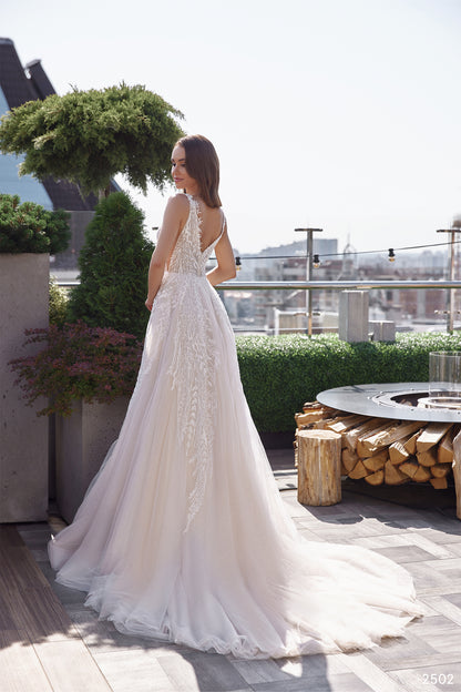 Blush tulle a-line beach wedding dress