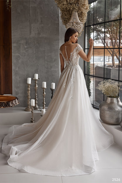 A-line tulle wedding gown with high slit