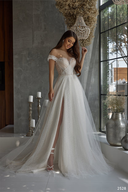 Off the shoulder beaded ethereal wedding dress
