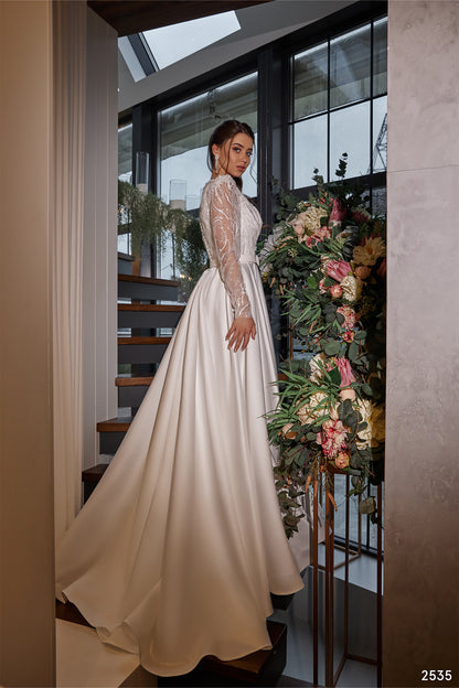 Modest long sleeve wedding dress