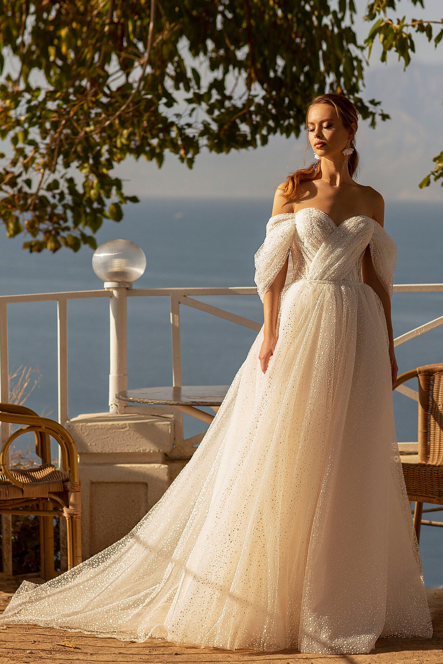 Off the shoulder a-line tulle wedding dress