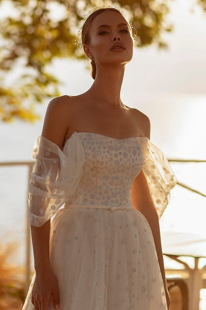Romantic tulle off the shoulder wedding dress