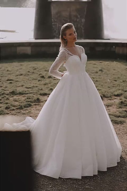 KatrinFAVORboutique-Beaded long sleeve ballgown wedding dress